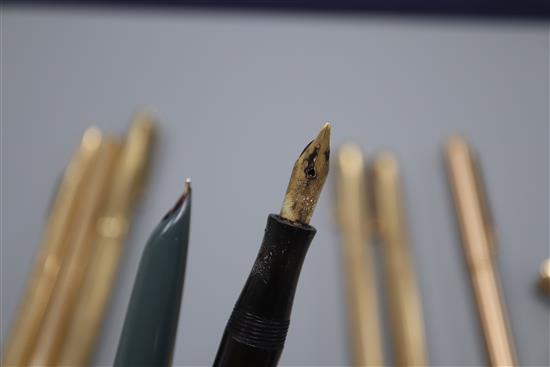 A group of assorted fountain and ballpoint pens